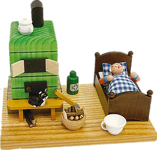 Räucherfigur Opa im Bett mit Ofen
